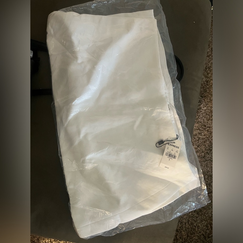 Brand new still in bag white Express skirt. I accidentally bought two.